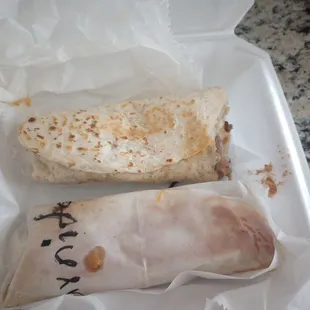 Mmmmm...Carne asada burrito and carnitas burrito - hold the sour cream, please!