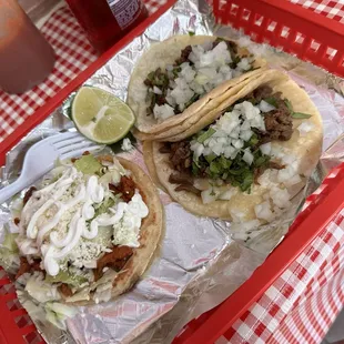 Carne asada tacos and Al pastor sope