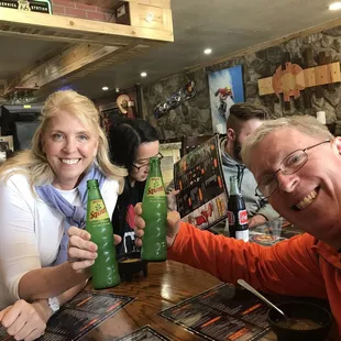 a man and a woman sitting at a table