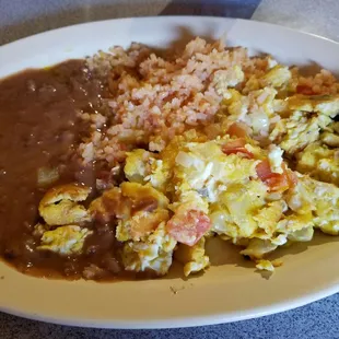 Huevos a la Mexicana, rice and beans.