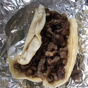 Steak taco, plain, to go.