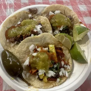 Al pastor, tripa and cabeza tacos with handmade tortillas