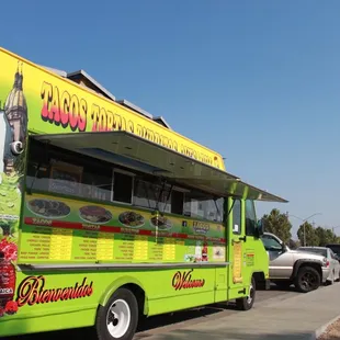 a food truck parked on the side of the road