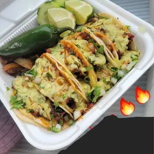 Tacos al Pastor with both guacamole &amp; red sauce!