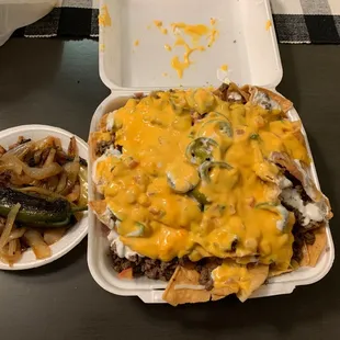 Asada Nachos &amp; a side of grilled onions.. delicious