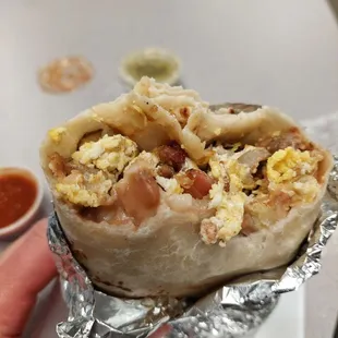Bacon breakfast burrito. A little too much undercooked bacon. Still loved it.