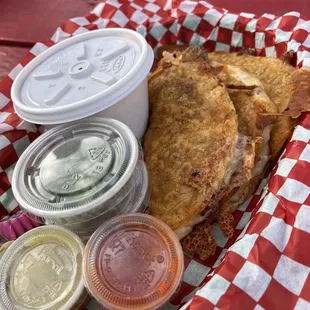a basket of food on a picnic table