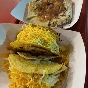 Wrapped up crunchy thing and double decker tacos.