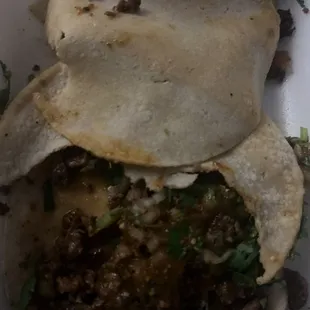 Asada tacos . Soggy undercooked tortillas