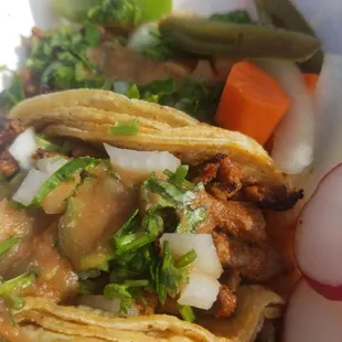 Mmm.  Taco Tuesday.  Two al pastor and one carne asada.