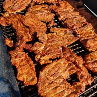 meat cooking on a grill