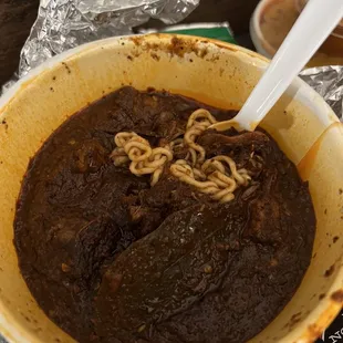  bowl of soup with noodles