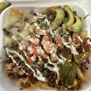 The nachos are not your normal nachos they are so filling. To where I could eat it all