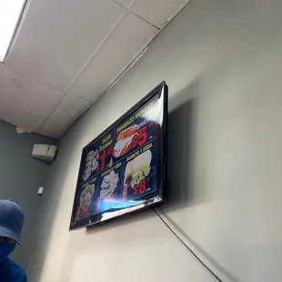 a television mounted on the wall