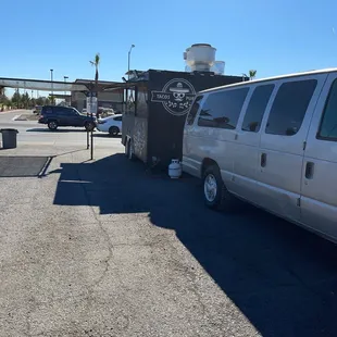 a white van parked in a parking lot