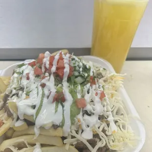 Asada fries &amp; passion fruit juice