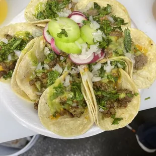 a plate of tacos on a table