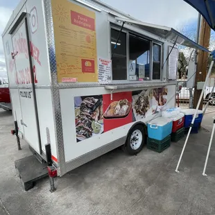 a food truck parked in a parking lot
