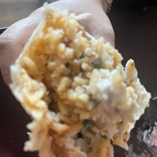 This is a Carne Asada super burrito but where is the meat? I love their food but my daughter doesn't cause if this.