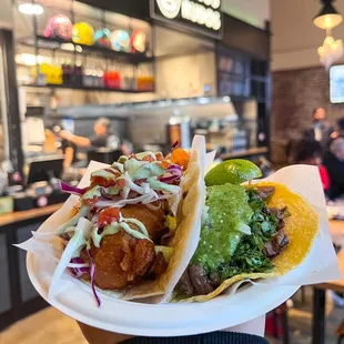 Pescado taco and steak taco