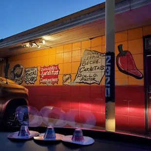 a car parked in front of a mexican restaurant