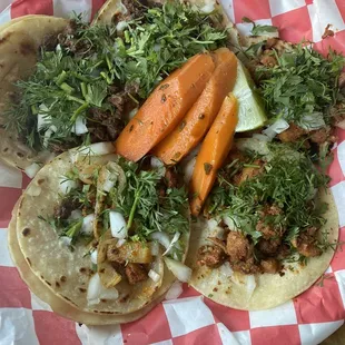 Chicken, carne asada and al pastor tacos