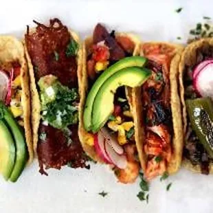 a row of tacoss