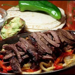 Meat lovers try the parrilladas AlPasTor, Sirloin or mixed.