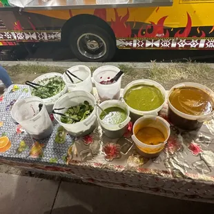 Toppings: Salsas, limes, cucumbers, radish, pickled vegetables, cilantro and onion