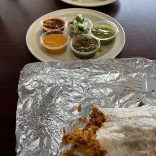 Pork burrito Salsa bar samples Pork and beef taco