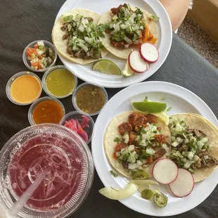 Asada and Al pastor tacos with Jamaica agua Fresca