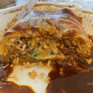 My wet burrito with only a tablespoon of meat. Gotta dig in to find it.