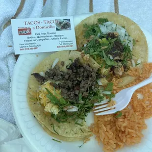 Steak tacos and rice.