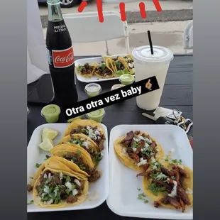 two plates of tacos on a table