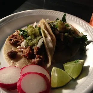 Two carnitas tacos.