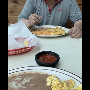 a man eating breakfast