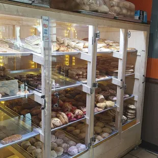 Flaky apple, pineapple, or cream turnovers.  Caramel filled churos.  Filled besos.  Muffins, cookies, palmiers.  Baked daily