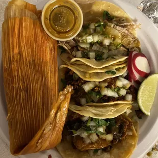 Pork tamale. Tacos: carnitas, pastor, chorizo.