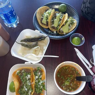 Birria tacos and steak tacos with consome