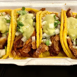 Four Al Pastor mini tacos