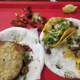 Tacos de cabeza and a dry ass mula  Mind you I ask for no sauce on my tacos and still got sauce that happens every time as well...