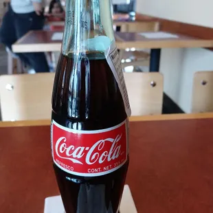 Ice cold Coke to drink.