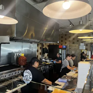 a group of people preparing food