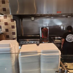 The al pastor cooking.
