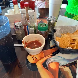 Chips, salsa and a couple of drinks.