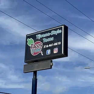 a sign for tacos tj