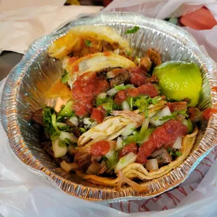 Steak, carnita and an el pastor taco trio complete with fresh Tortilla chip fast friendly and unexpectedly tasty  I'll be back!