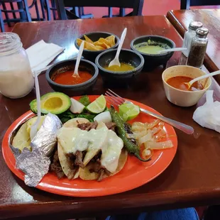 Beef tacos with queso.