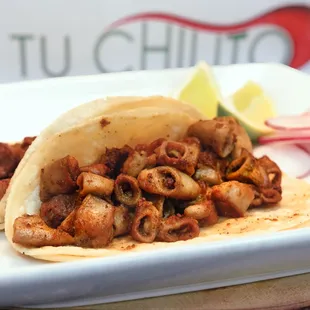 a tortilla filled with octopus