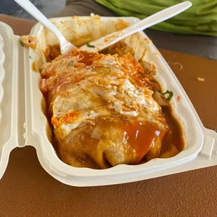 two take out containers of food